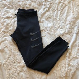Lightly worn women’s Nike large running leggings
